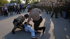 Noem visits Chicago area ICE facility as agents detain multiple protesters outside
