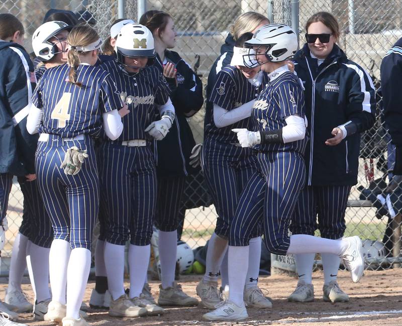 Woodland/Flanagan-Cornell's short stop Olivia Chrismarick makes a late catch at second base as Marquette's Maisie Lyons reaches second base on Wednesday, March 27, 2024 in Ottawa.