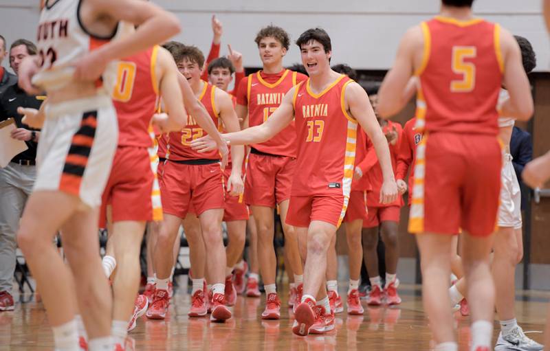 Batavia celebrate defeating Wheaton-Warrenville South in Wheaton on Saturday, January 6, 2024.