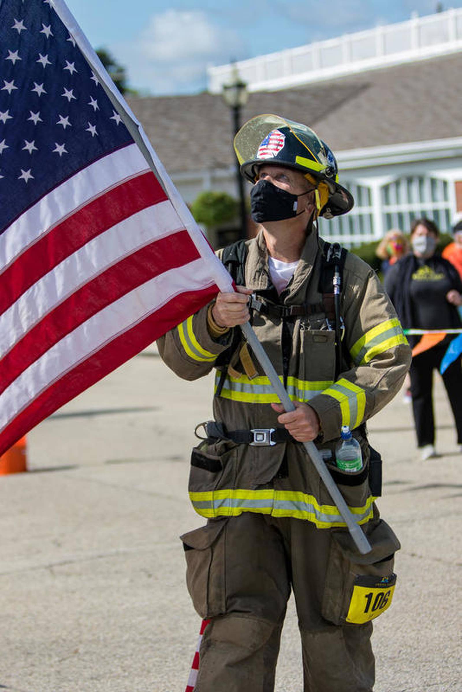 Crystal Lake firefighter runs half marathon in full gear, tank and all