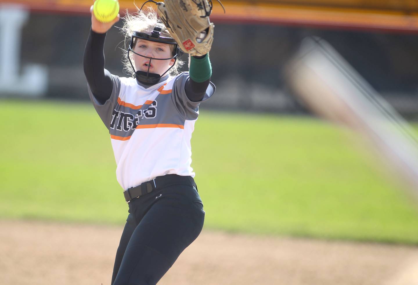 Wheaton Warrenville South’s Maddie Pool pitches during a home game against St. Charles North on Thursday, April 14, 2022.