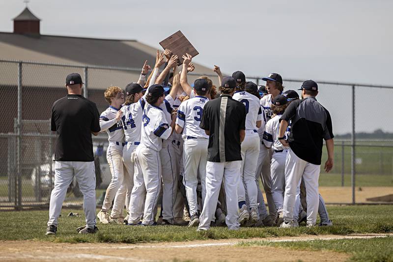 Burlington Central celebrates winning against Sterling during a class 3A regional final in Rochelle Saturday, May 27, 2023.