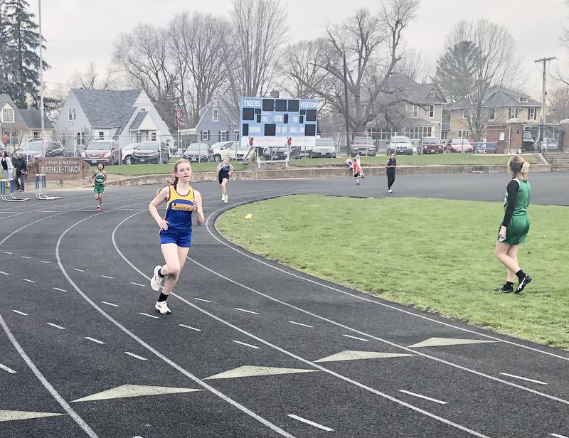 Princeton Logan's Payton Frueh runs in the seventh-grade 400m dash Monday at PHS' Rathje Track.