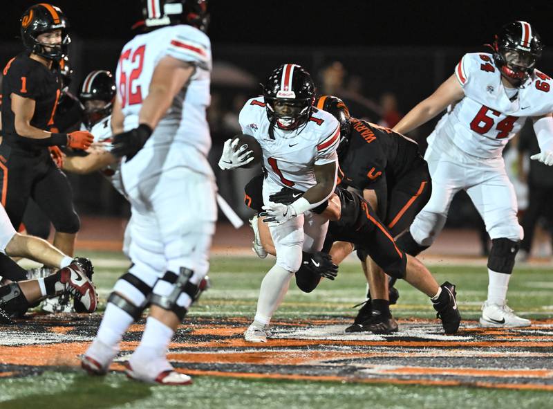 Lincoln-Way Central's Justin Cobbs (1) rushes the ball during the conference game against Lincoln-Way West on Friday, SEP. 19, 2025, at New Lenox.