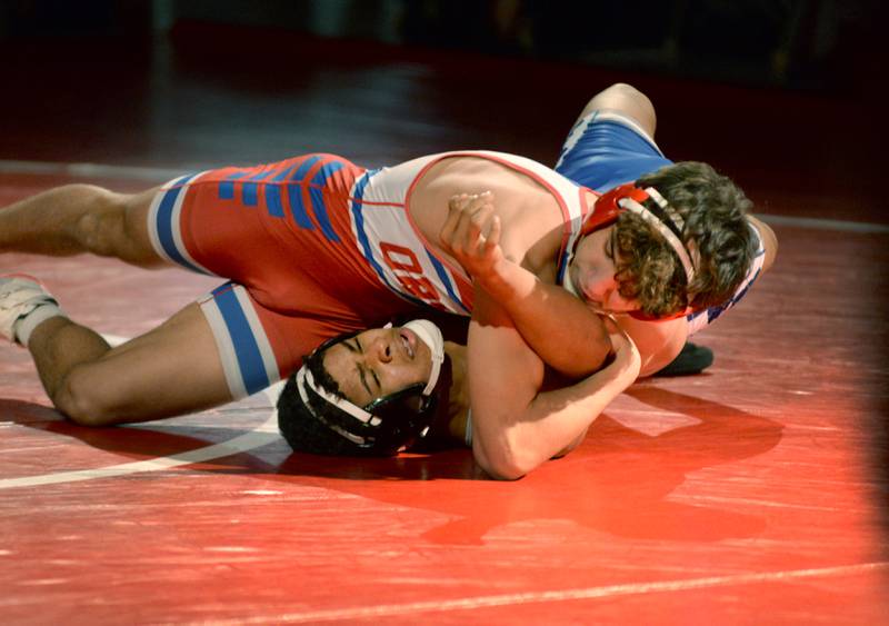 Oregon's Jayden Berry holds Sterling Newman's Josiah Lewis on the mat in the 150-pound match at the 1A team sectional held Tuesday, Feb. 25, 2025 in the Blackhawk Center in Oregon. The Hawks beat Newman 39-30 to advance to the state final this weekend.