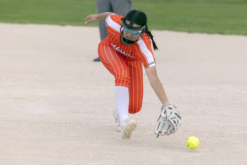 Milledgeville’s Lexis Grenoble isn’t able to snag a grounder to right against Morrison Tuesday, May 13, 2025.