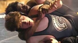 Photos: DeKalb hosts rival Sycamore on the mat