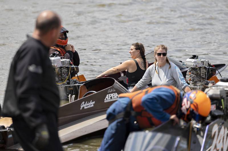 Pit crews work to get boats ready for the news race Saturday, July 12, 2025, during Rock Falls’ River Chase.