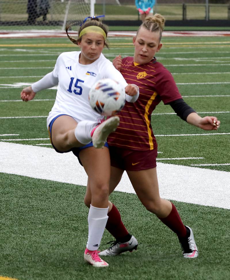 Johnsburg's Lauren McQuiston battles with Richmond-Burton's Josie Franckowiak for control of the ball during a Kishwaukee River Conference soccer game on Tuesday, April 1, 2025, at Richmond-Burton High School.