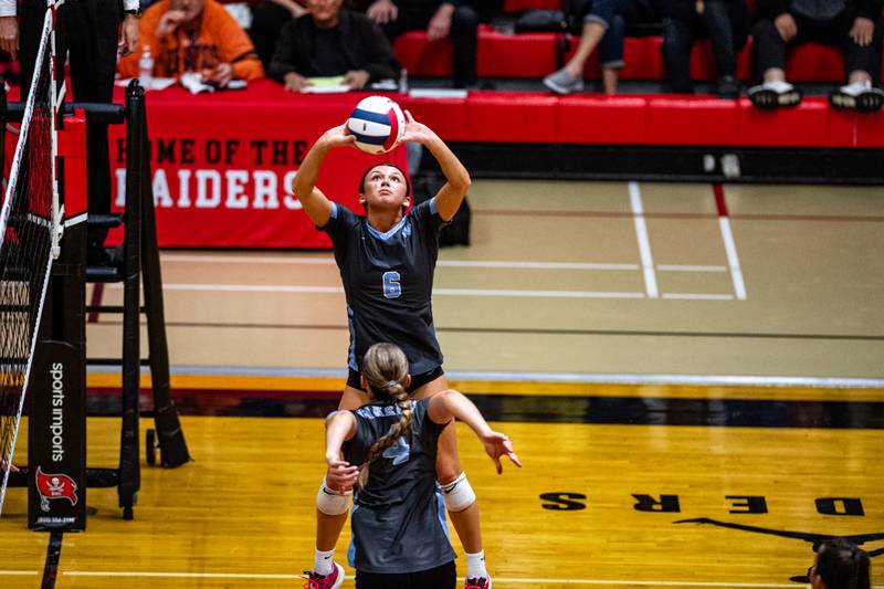 Willowbrook's Hannah Kenny sets the ball for teammate Eliza Ramey during the super-sectional game against Joliet West on Friday Nov. 3, 2023 at Bolingbrook High School