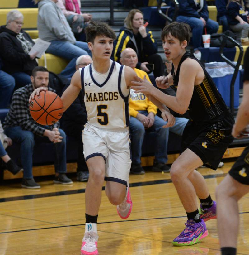Polo's Gus Mumford dribbles as Ashton-Franklin Center's Noah Danielson defends on Tuesday, Jan. 2, 2024 at Polo High School.