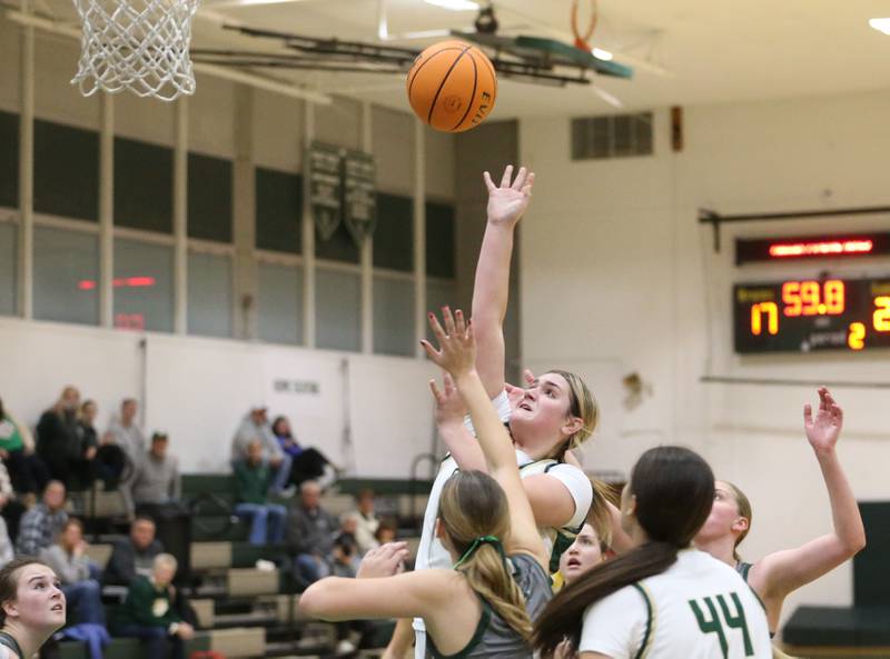 St. Bede's Savannah Bray lets go of a shot over Midland's Jordyn Puyles on Thursday, Dec. 4, 2025 at St. Bede Academy.