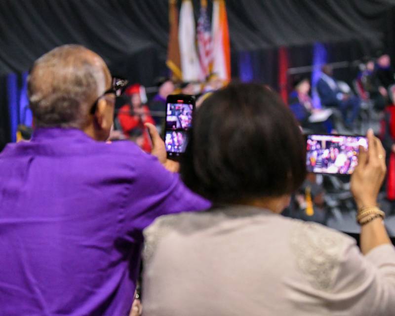 Friends and family record video and take photos of their graduates during the Northern Illinois University Class of 2025 Commencement ceremony held on Saturday, May 10, 2025, at the Convocation Center in DeKalb.