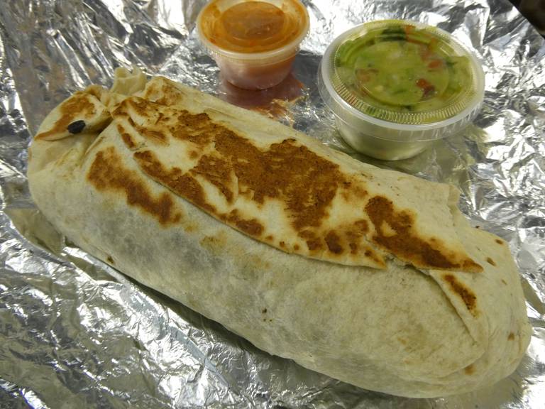 The chicken burrito at Mario's Restaurant in Crystal Lake; the venue offers a small but colorful setting for Mexican favorites; the new restaurant offers a sit-down version of offerings from the owners' food truck, "Mario's Cart."