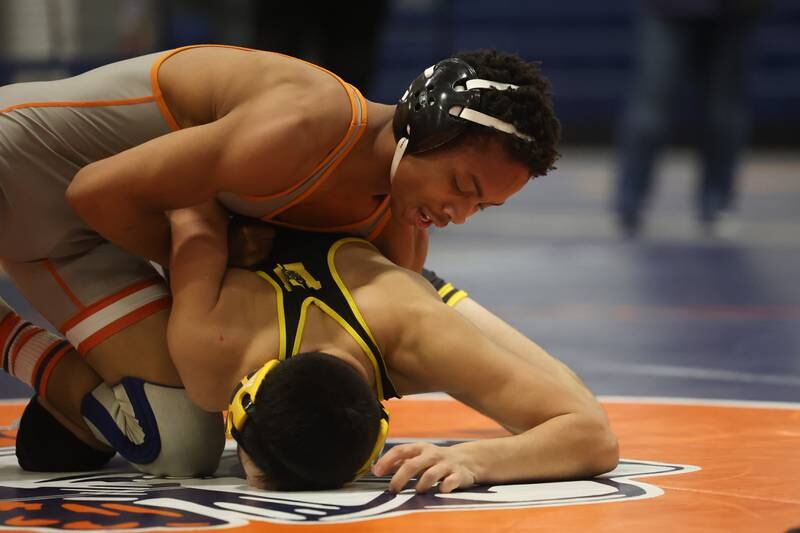 Romeoville’s Brian Farley attempts to roll Joliet West’s Joseph Perdrosa in a dual meet on Thursday, Dec.14th, 2023 in Romeoville.