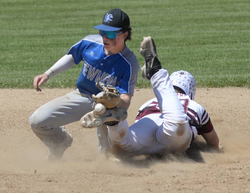 Newman's Garret Matznick fields a throw to try and tag a Dakota baserunner at second base during the 1A Pearl City Sectional championship on Saturday, May 27.