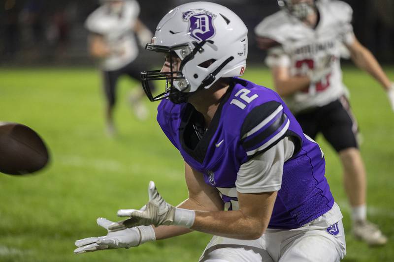 Dixon’s Jackson Koehler hauls in a pass for a first down against Stillman Valley Friday, Oct. 3, 2025.