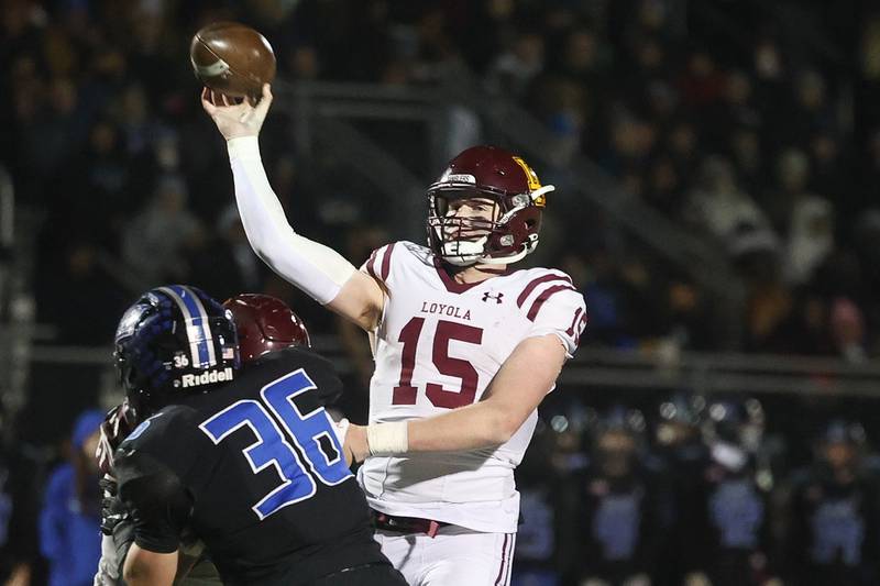 Loyola’s Ryan Fitzgerald passes for a touchdown against Lincoln-Way East in the Class 8A semifinal on Saturday, Nov. 23, 2024 in Frankfort.