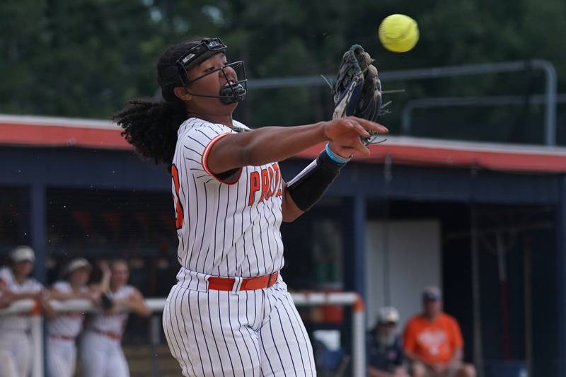 Oswego’s Jaelynn Anthony (20) fields a bunt and throws to first for an out agains Yorkville during a softball game at Oswego High School on Thursday, May 15, 2025.