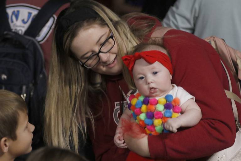 Vanessa Plewa, of Island Lake, dances with her daughter, Cora, 3 months, during a Halloween dance party Wednesday, Oct. 19, 2022, at the Algonquin Area Public Library, 2600 Harnish Drive in Algonquin.