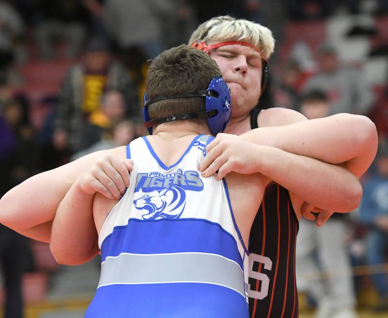 Fulton's Braiden Damhoff lifts Princeton's Cade Odell at the start of their 285-pound match at the 1A Oregon Wrestling Sectional on Friday night.
