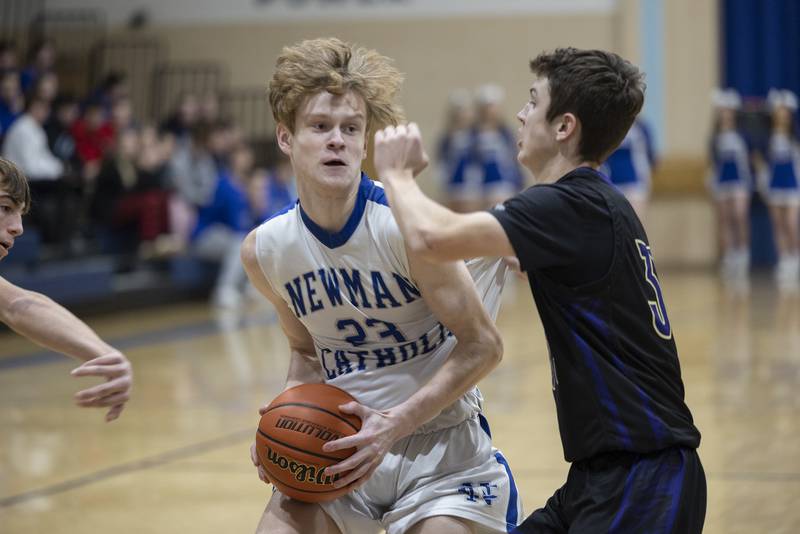 Newman’s Lucas Simpson works below the basket Tuesday, Dec. 13, 2022 against Pecatonica.
