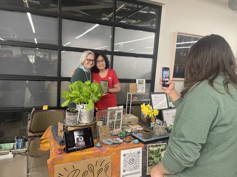 Kristen Borre (left) and Jo Plenger-Schultz (right) are seen Saturday, April 11, 2026, posing for a picture during the annual DeKalb County Earth Fest held in NIU's Founders Memorial Library in DeKalb.
