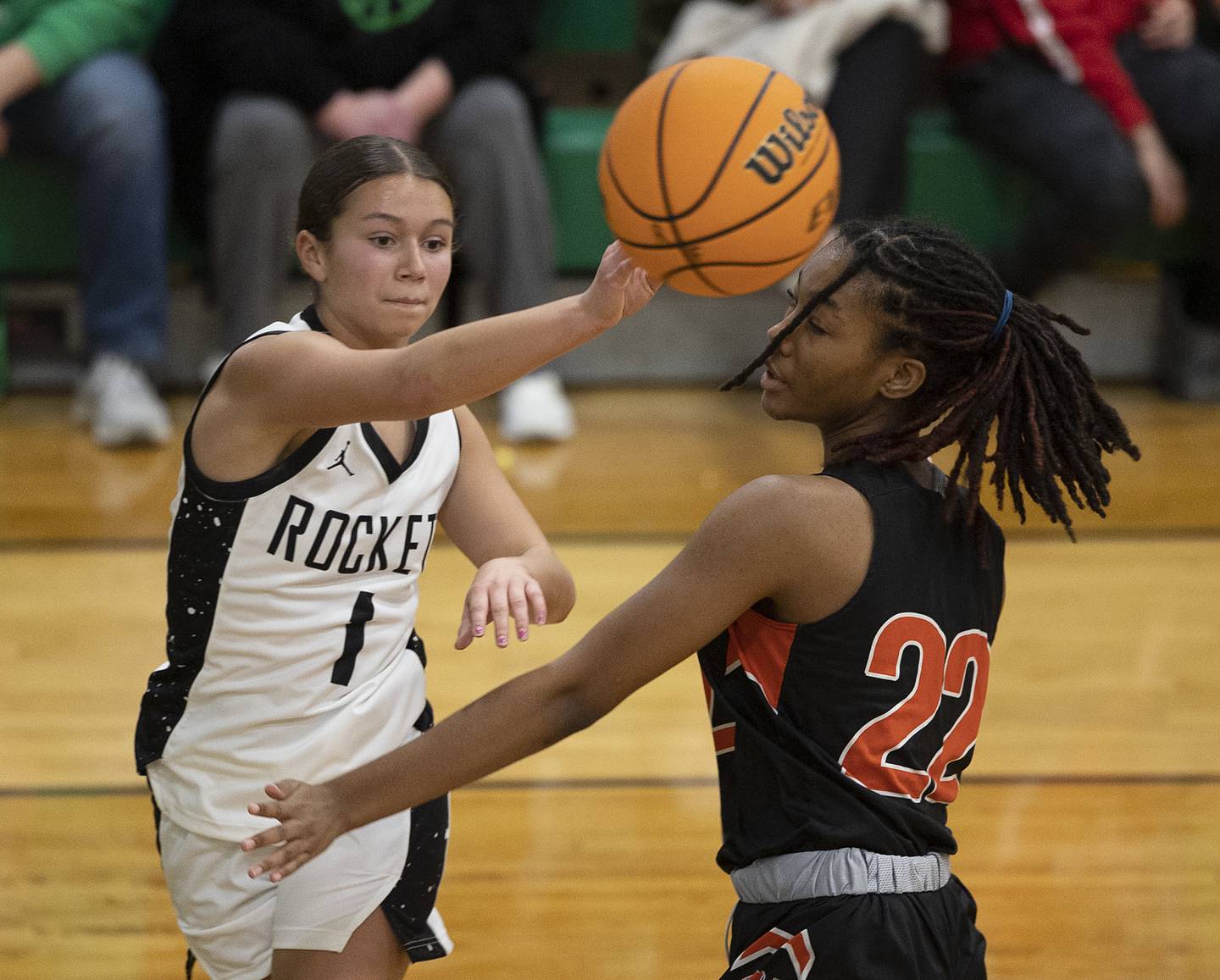 Rock Falls’ Elizabeth Lombardo makes a pass against Sandwich’s Alayla Harris Tuesday, Nov. 26, 2024, at Rock Falls High School.