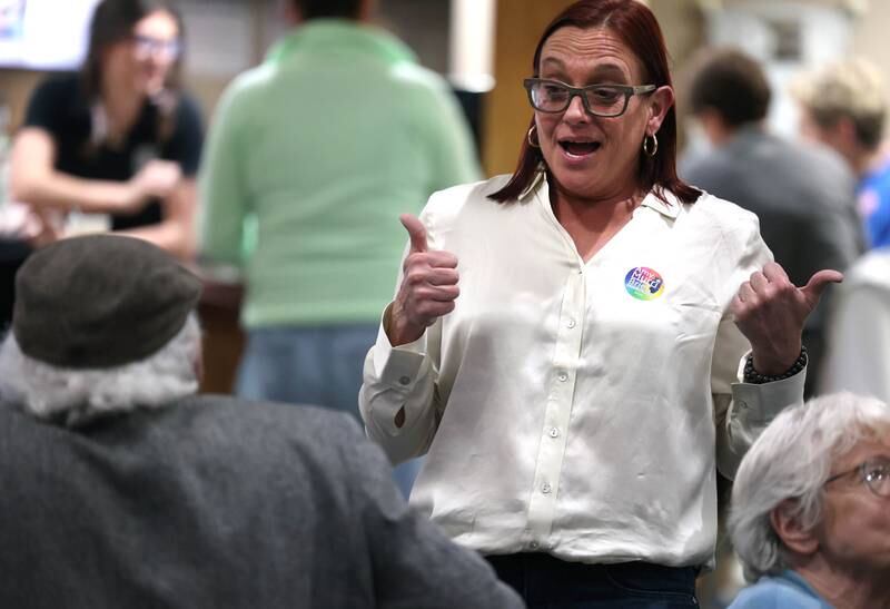 Amy “Murri” Briel, Democratic candidate in the 76th District state representative race, gives a thumbs up to DeKalb County Board candidate Stewart Ogilvie Tuesday, Nov. 5, 2024, at the election night watch party at River Heights Golf Club in DeKalb.