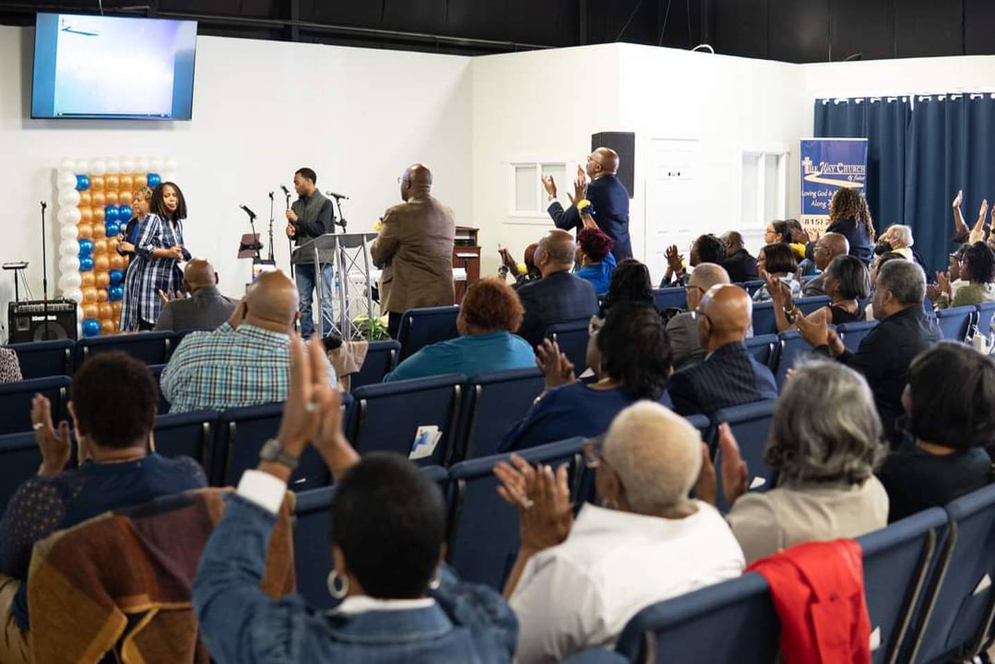 Members of The Way Church of Joliet celebrate its eighth anniversary in April 2022 in its new space on Theodore Street in Joliet.