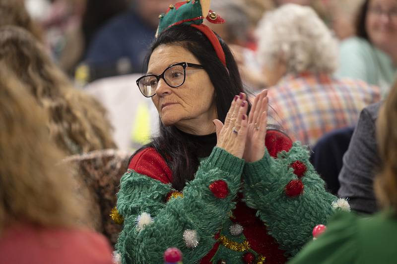 Kelley Clifton dons her luckiest Christmas sweater Thursday, Nov. 21, 2024, for Rock Falls Chamber’s holiday bingo event at the American Legion. Clifton was there with a group from Lotus Salon.