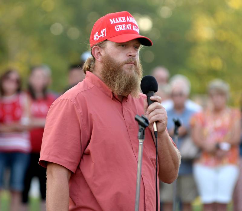 Jimmy Snodgrass of Byron speaks at a candlelight vigil for Charlie Kirk in downtown Oregon on Sunday, Sept. 14, 2025. Snodgrass was one of the event's organizers.