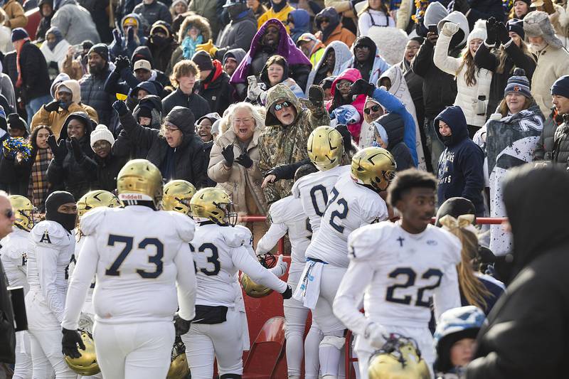 Althoff Catholic celebrates their win over Lena-Winslow Friday, Nov. 29, 2024, in the class 1A football state final.