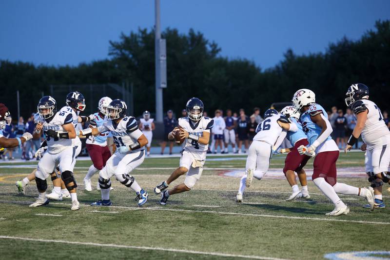 Nazareth's Frankie Nichols maneuvers with the ball during Kankakee's 33-12 loss to Nazareth on Friday, Aug. 29, 2025.