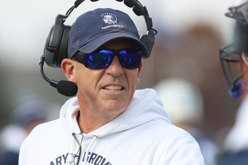 Cary-Grove’s head Coach Brad Seaburg guides the Trojans against Belvidere North in IHSA Class 6A quarterfinal playoff football action on Saturday, Nov. 16, 2024, at Al Bohrer Field on the campus of Cary-Grove High School in Cary.