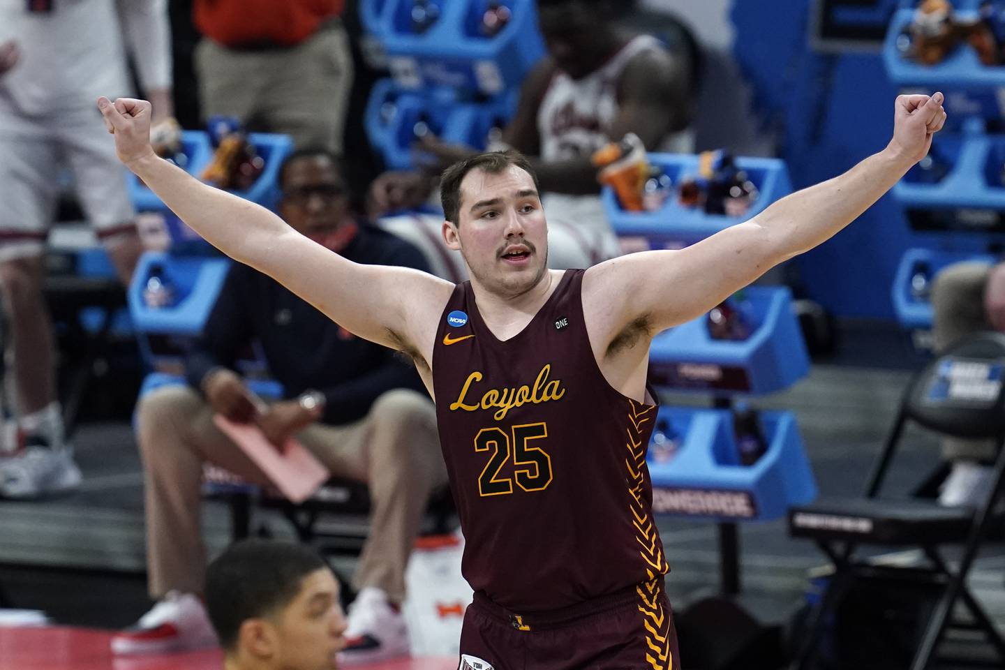 Loyola center Cameron Krutwig reacts to a basket against Illinois during the second round of the 2021 NCAA tournament at Bankers Life Fieldhouse in Indianapolis.