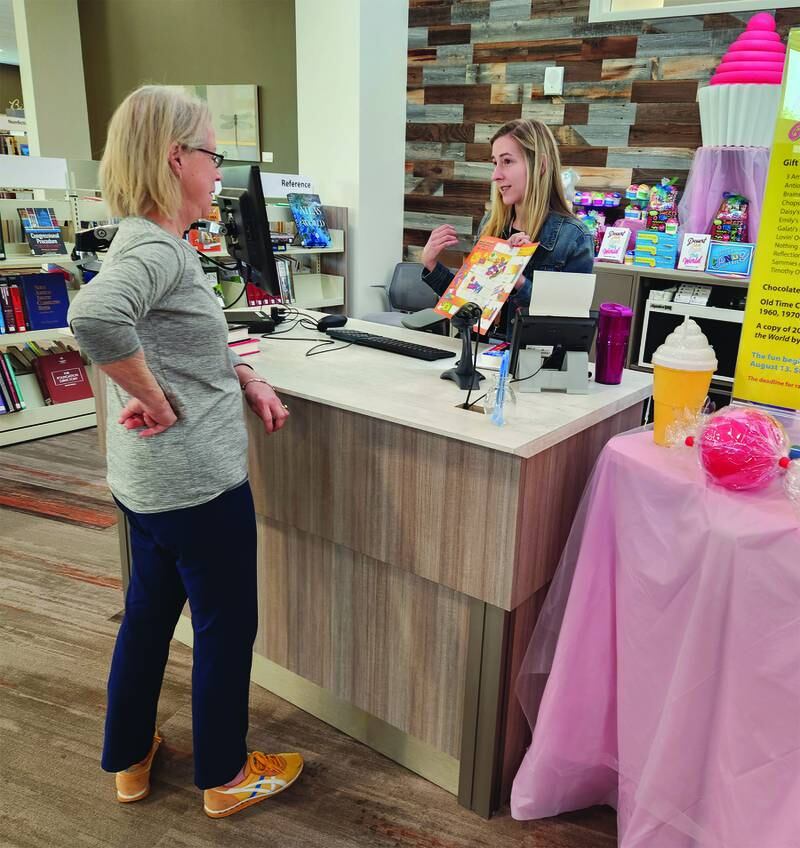 Adults sign up for the Lake Villa Library District's Sweet Summer Reading program.