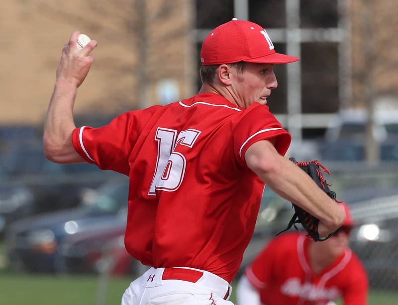 Naperville Central's Chase Reeder delivers a pitch Monday, April 28, 2025, during their game at DeKalb High School.