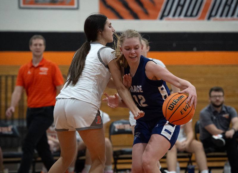 Grace Christian's Kaitlyn Jorgensen, right, controls the ball as Beecher's Grace Wuest, left, guards in a game on Monday, January 5, 2026.