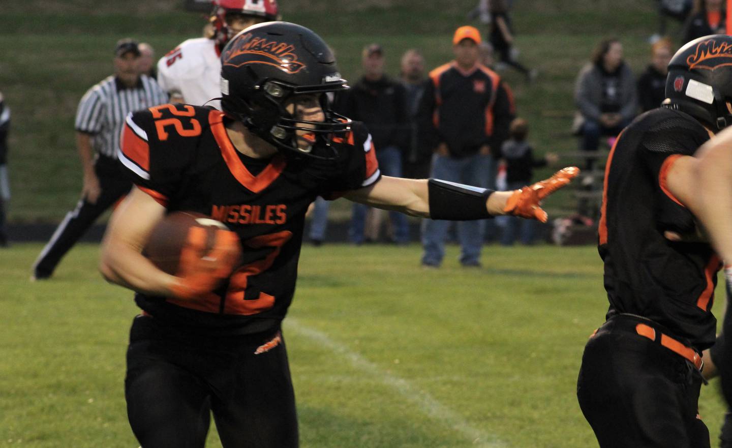 Milledgeville's Ashton Nobis, a senior running back, follows a blocker on Friday, Sept. 3, 2021, in an 8-man football game at Milledgeville High School.