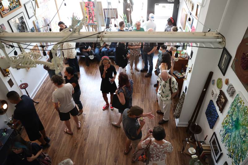 The Strange & Unusual Gallery hosted a pre-party for the The Art Movement Stone and Steel art event in downtown Joliet. Joliet’s arts nonprofit The Art Movement commissioned five sculptures that represent Joliet’s heritage of stone and steel. Thursday, July 28, 2022 in Joliet.