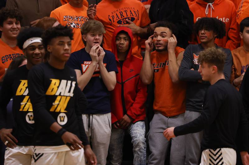 A Romeoville fan tries to get in the head of Joliet West’s Jeremy Fears during warmups on Tuesday January 31st, 2023.