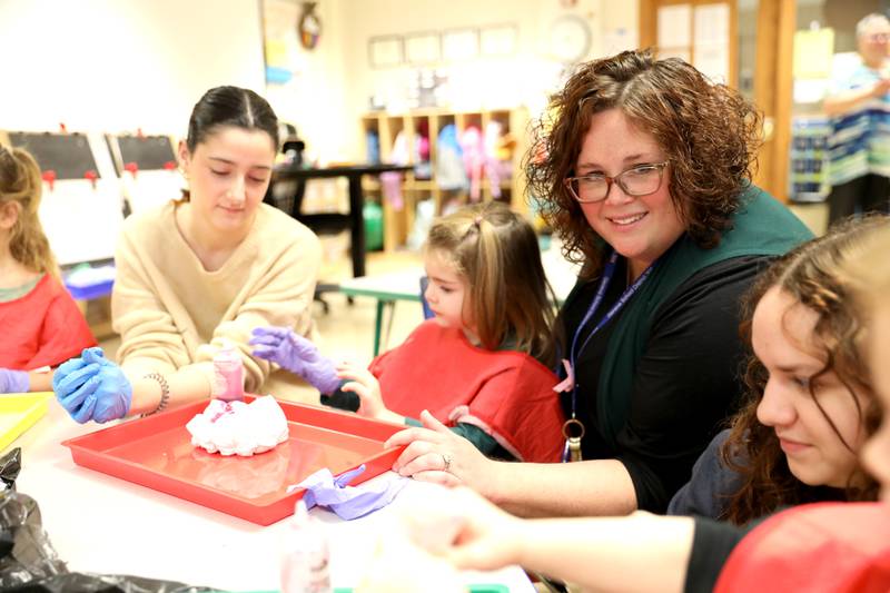 Sara Consdorf (right) is a family and consumer sciences teacher at Geneva High School and runs the school’s Little Vikings program to give high school students hands-on experience with toddlers. She is teacher of the year for the Illinois Affiliate of the American Association of Family and Consumer Sciences.