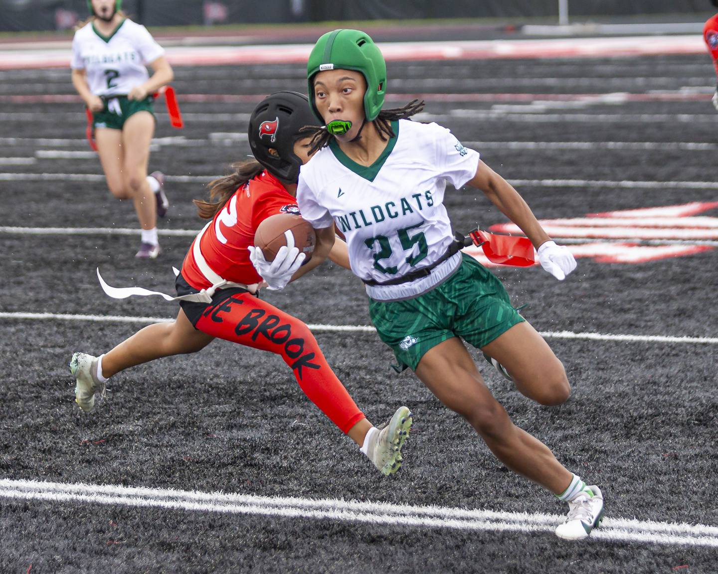 Plainfield Central's Shania Davison (25) takes off down the sidelines with the defense in pursuit during flag football game between Plainfield Central at Bolingbrook Wednesday, Sept 3, 2025  in Bolingbrook.