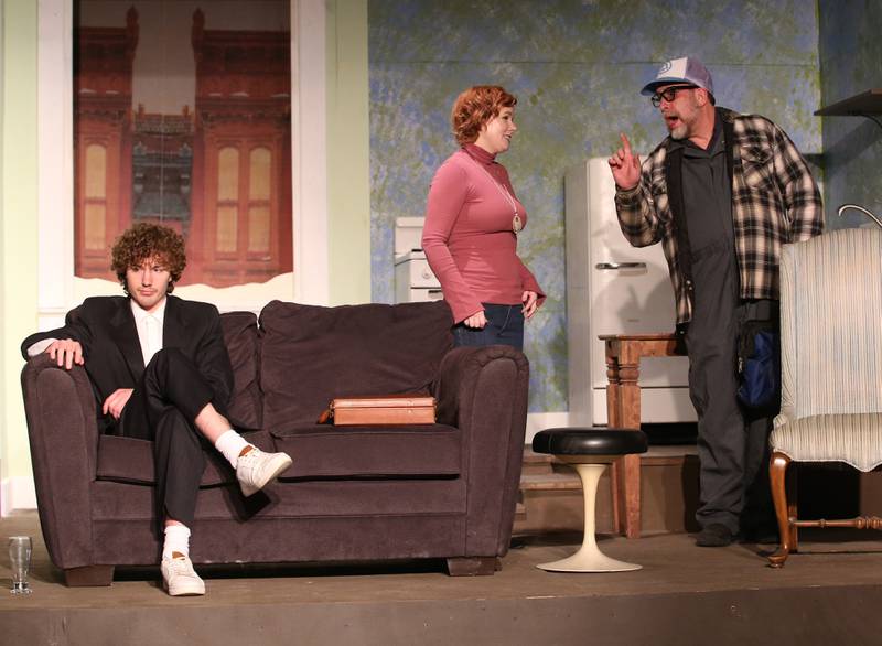Luke Dougherty as Paul, Devon Ford as Corie, Gary Talsky as the Telephone Repairman act out a scene in 'Bearfoot in the Park' on Thursday, April 6, 2023 at Stage 212 in La Salle.