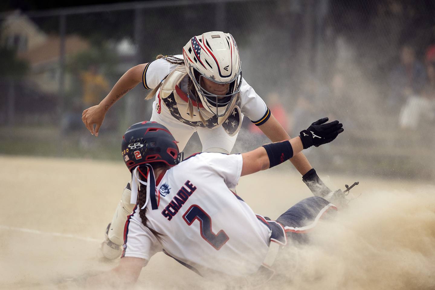 Sterling’s Marley Sechrest tags out Belvidere North’s Isabelle Schadle Friday, May 30, 2025, in the Class 3A Regional final in Dixon.