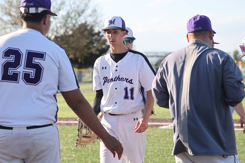 Manteno’s Braden Campbell is high-fived as he returns to the dugout during the Panthers’ 8-7 victory over Herscher on Tuesday, May 6, 2025.
