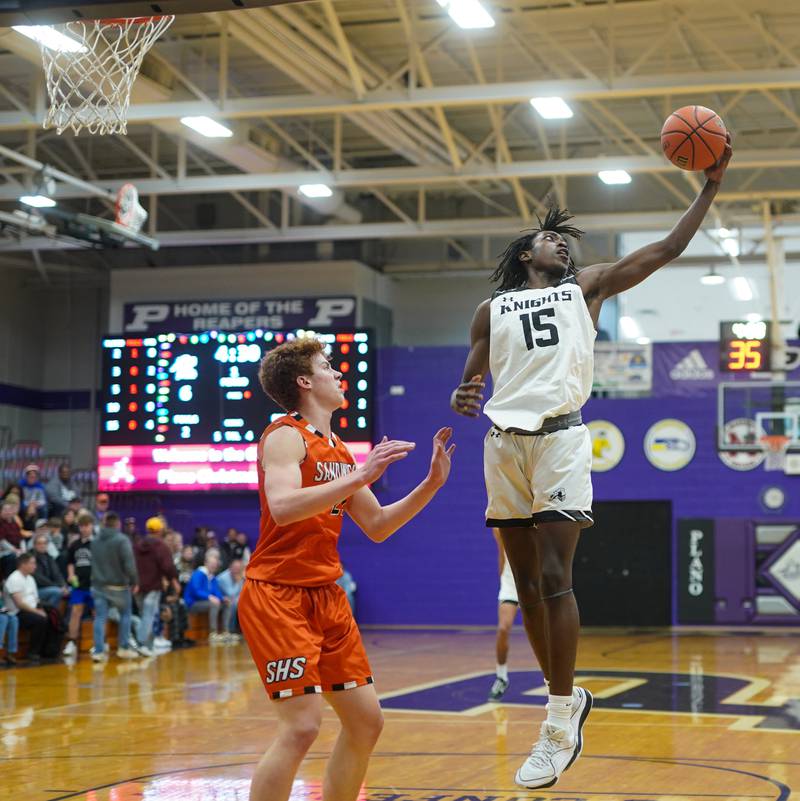 Photos Kaneland vs. Sandwich boys basketball in the 60th Plano