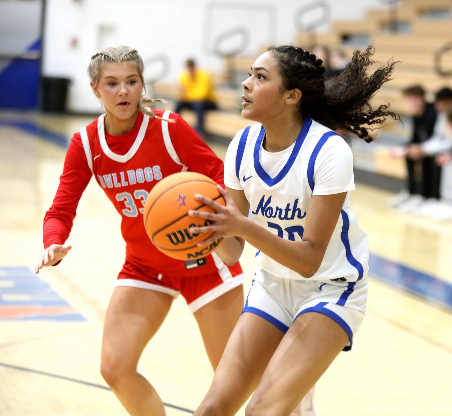St. Charles North's Sydney Johnson looks to shoot the ball during a game against Batavia on Tuesday, Feb. 4, 2025 in St. Charles.