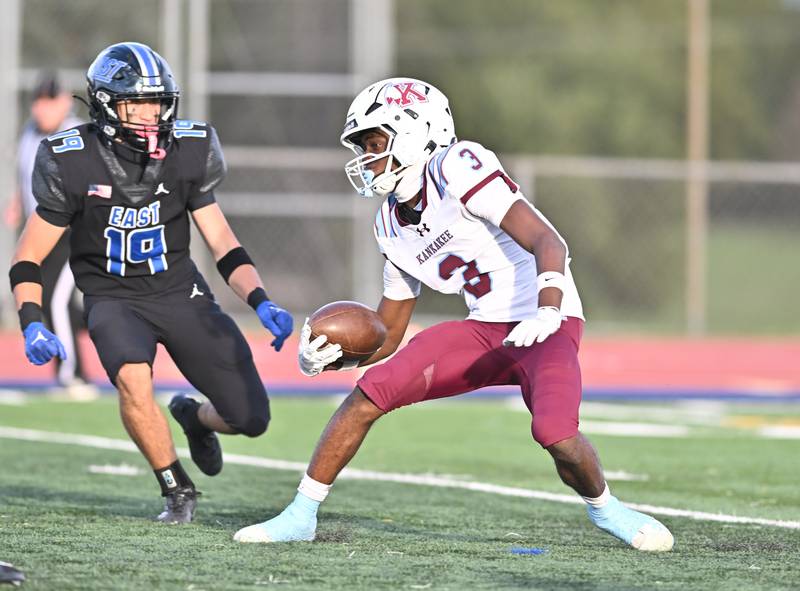 Kankakee's Cedric Terrell (3) attempts to return a kickoff during the non-conference game against Lincoln Way East on Friday, Sept. 05, 2025, at Frankfort.